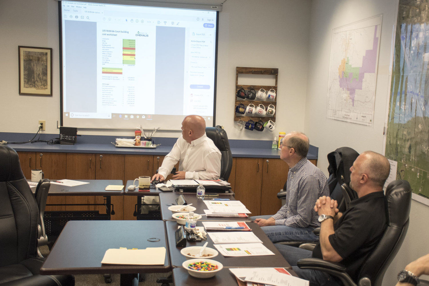 FILE PHOTO — Port of Chehalis CEO Randy Mueller provides the commission with an update on the 105 McBride Court building project in March 2019.